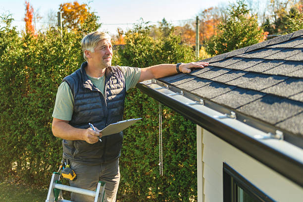 Professional Roof Replacement technician working in Mendota, CA